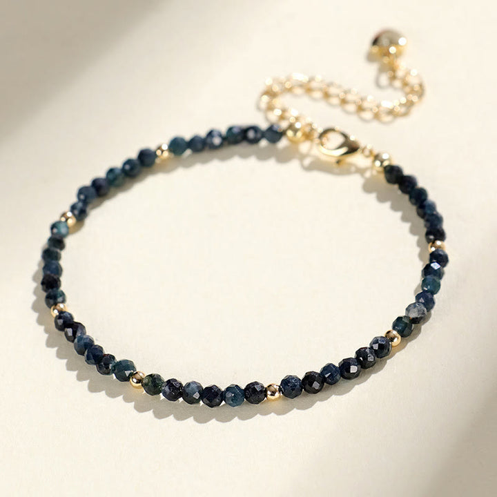 Pulsera de sabiduría con cuentas de cobre, turmalina e indicolita de Buddha Stones