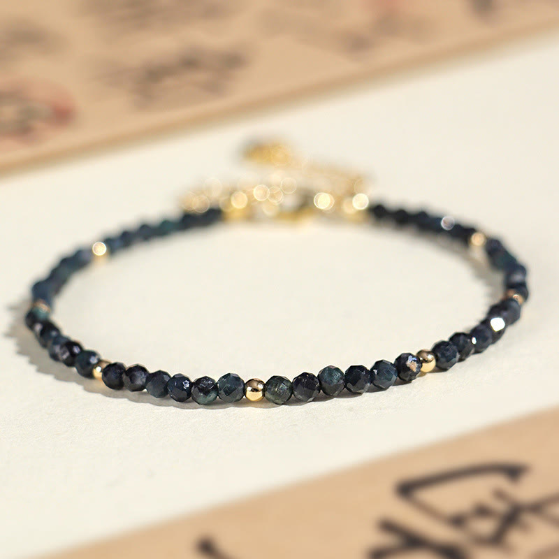 Pulsera de sabiduría con cuentas de cobre, turmalina e indicolita de Buddha Stones