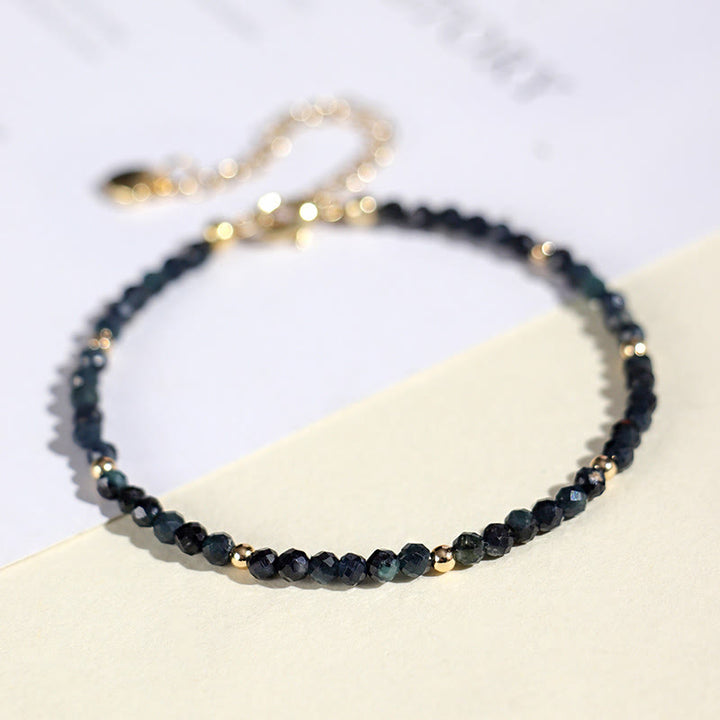 Pulsera de sabiduría con cuentas de cobre, turmalina e indicolita de Buddha Stones