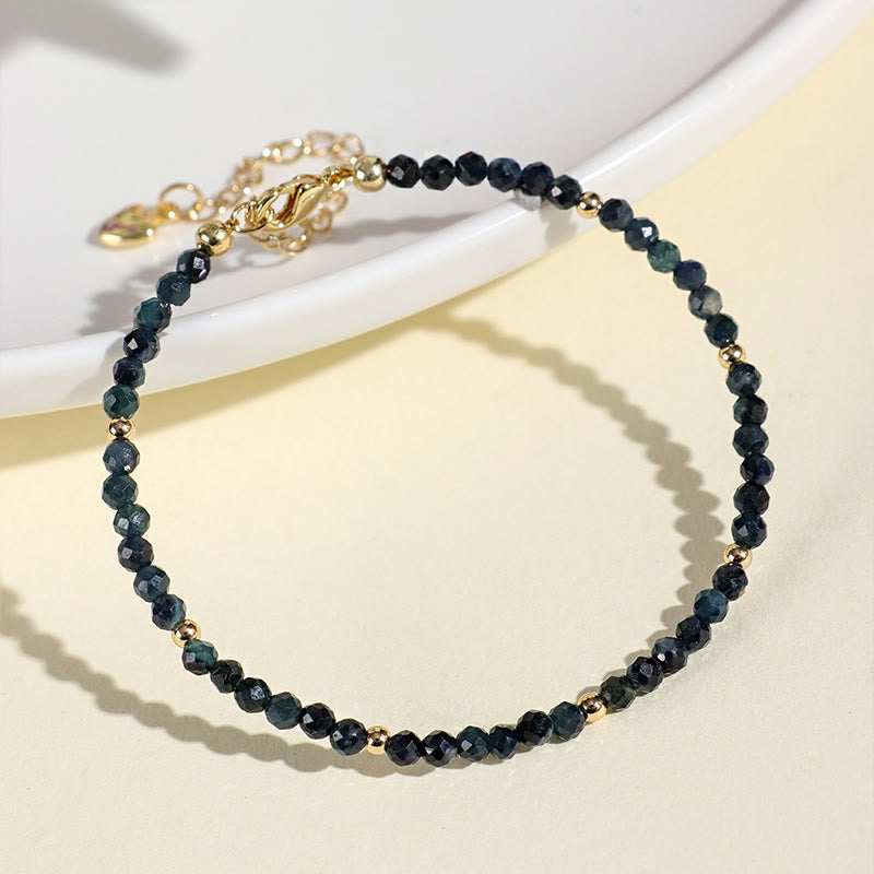 Pulsera de sabiduría con cuentas de cobre, turmalina e indicolita de Buddha Stones