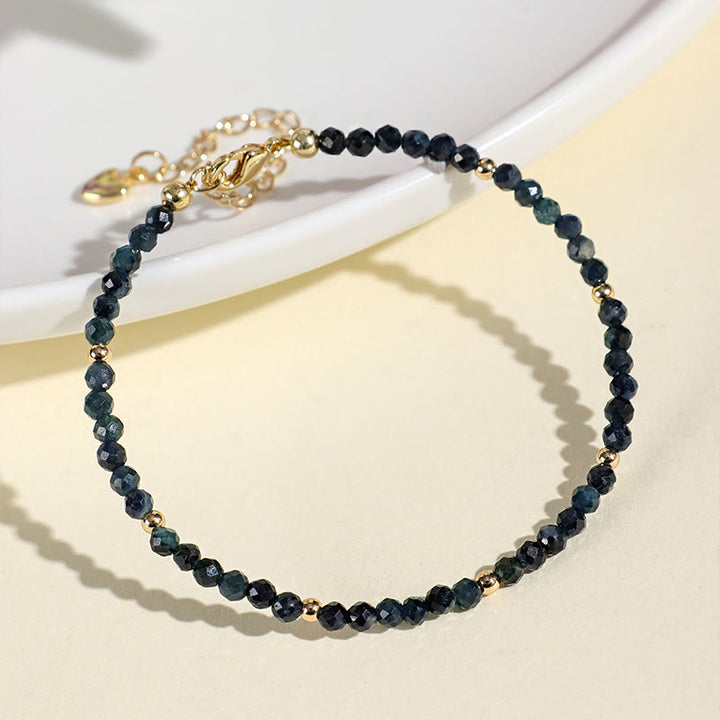 Pulsera de sabiduría con cuentas de cobre, turmalina e indicolita de Buddha Stones