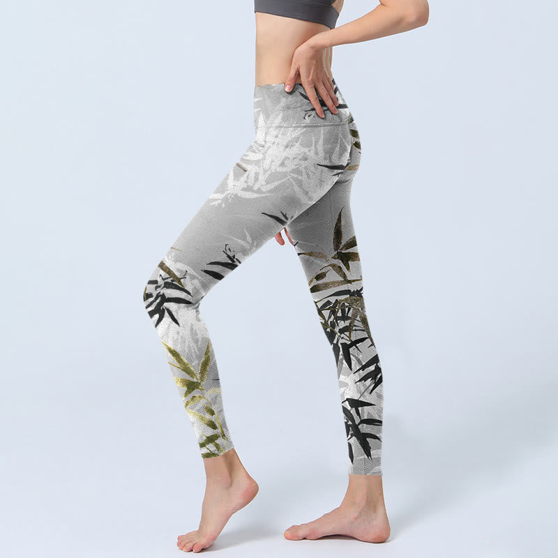 Leggings de yoga para mujer con estampado de hojas de bambú y Buddha Stones en color gris oscuro - image 3