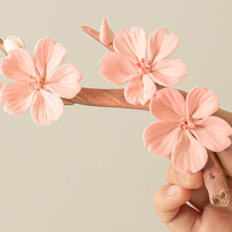 Quemador de incienso de cerámica curativo con ramas de ciruelo en flor y Buddha Stones para decoración de escritorio