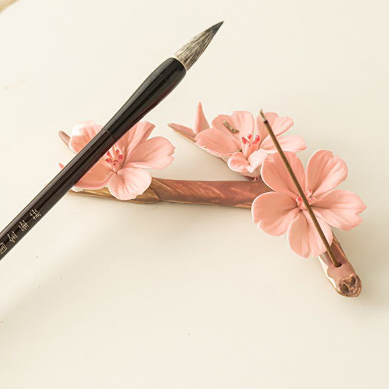 Quemador de incienso de cerámica curativo con ramas de ciruelo en flor y Buddha Stones para decoración de escritorio