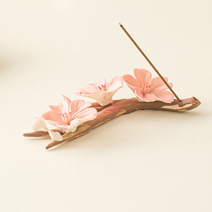 Quemador de incienso de cerámica curativo con ramas de ciruelo en flor y Buddha Stones para decoración de escritorio