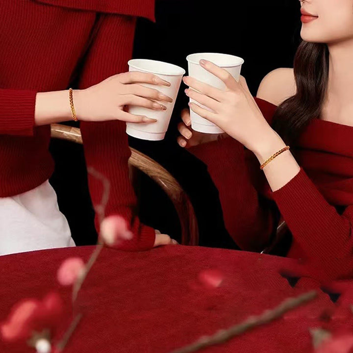 Pulsera de la suerte con hilo rojo y amarillo y Buddha Stones