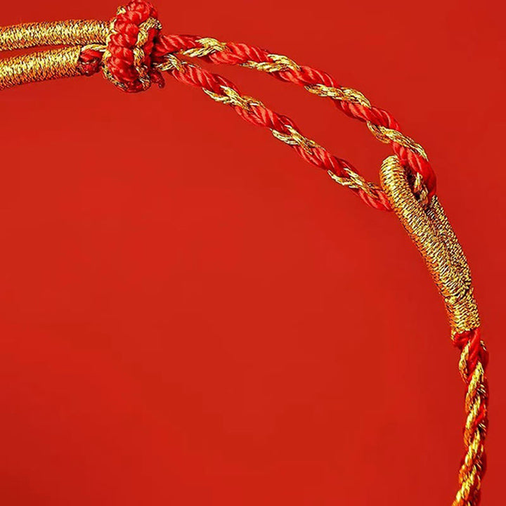 Pulsera de la suerte con hilo rojo y amarillo y Buddha Stones