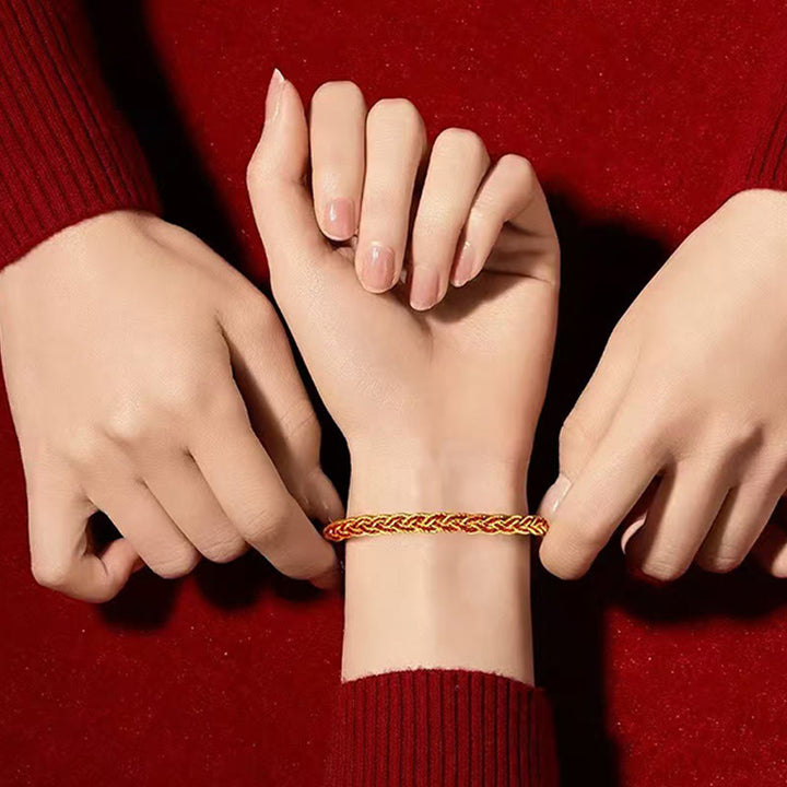 Pulsera de la suerte con hilo rojo y amarillo y Buddha Stones