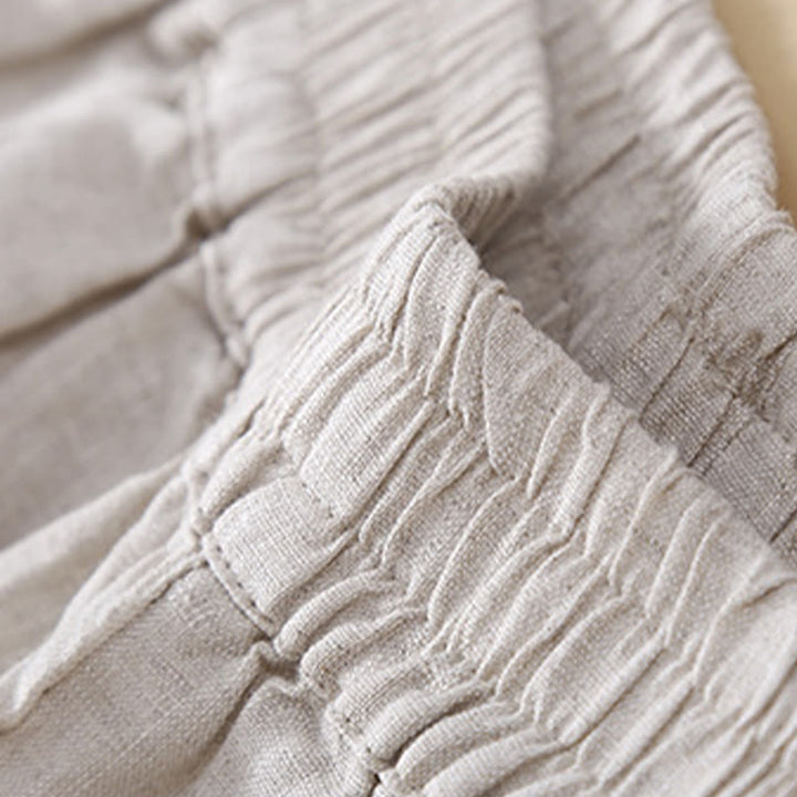 Pantalones de lino con bordado de flores en los laterales y bolsillos para mujer con Buddha Stones