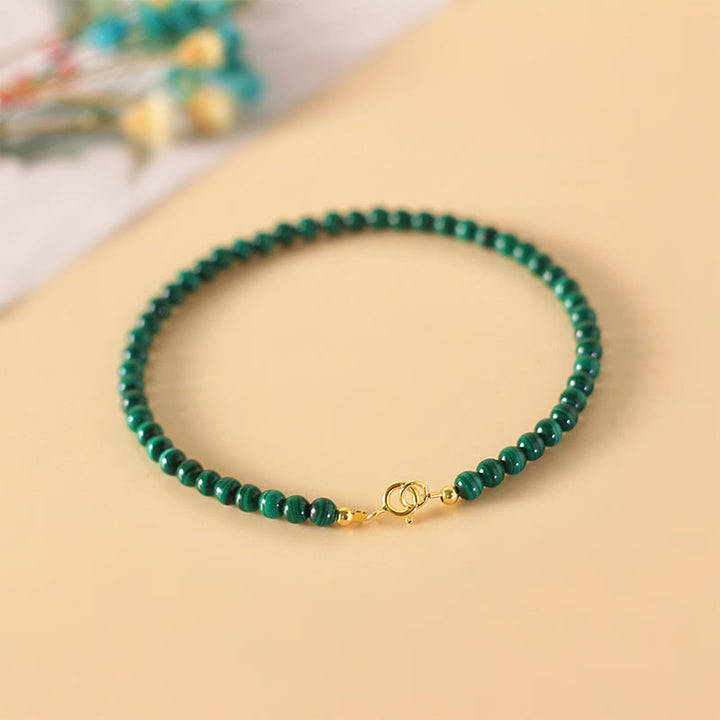 Pulsera antiansiedad de cobre bañada en oro de 14 k con cuentas de malaquita natural de 4 mm y Buddha Stones