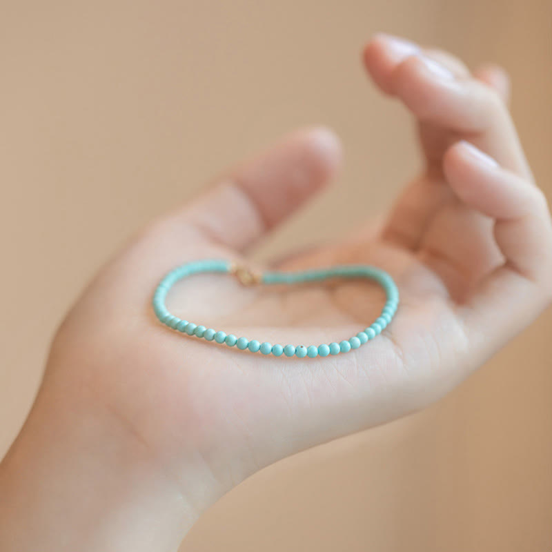 Pulsera de la sabiduría de cobre bañada en oro de 14 k con cuentas ultrafinas de turquesa de 2 mm y Buddha Stones