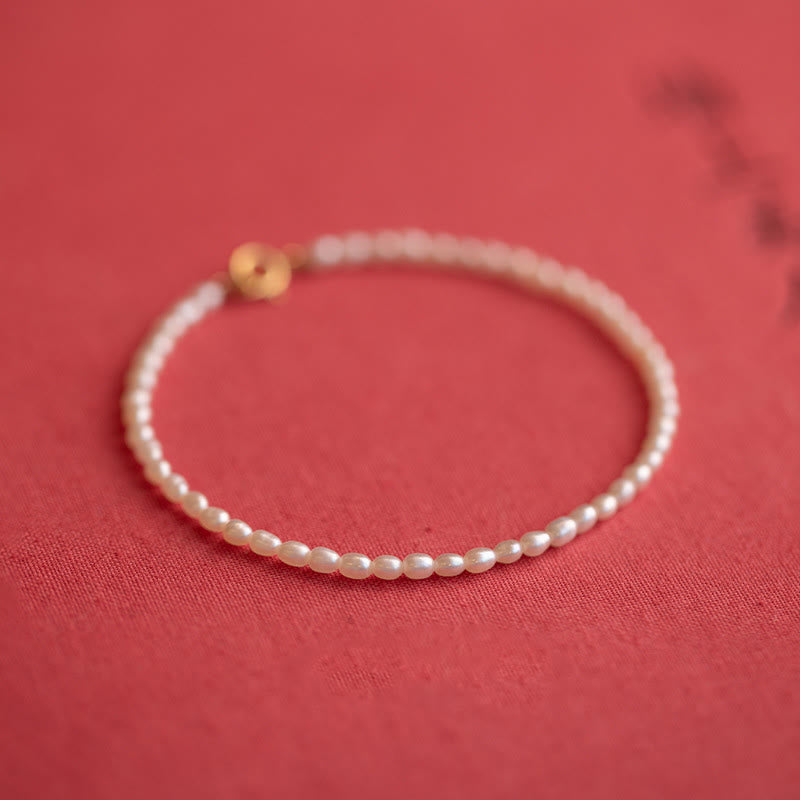 Pulsera de la sabiduría de cobre bañada en oro de 14 k con perlas naturales ultrafinas de 2 mm y Buddha Stones