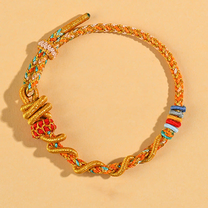 Pulsera de la suerte del año de la serpiente con serpiente y dragón de hilo colorido de Buddha Stones