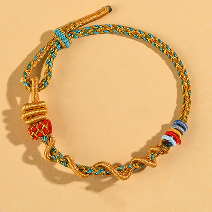 Pulsera de la suerte del año de la serpiente con serpiente y dragón de hilo colorido de Buddha Stones