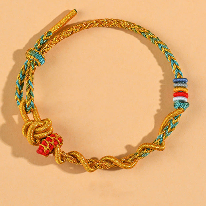 Pulsera de la suerte del año de la serpiente con serpiente y dragón de hilo colorido de Buddha Stones