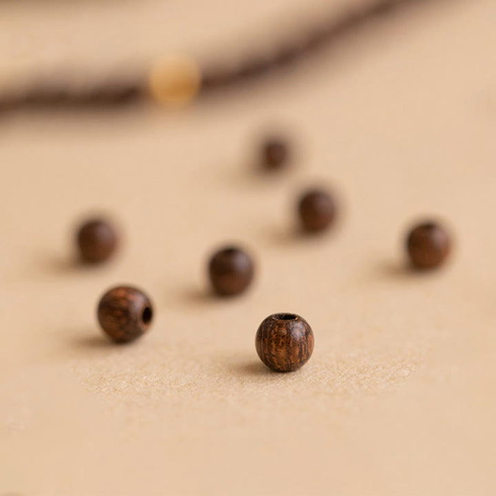 Pulsera protectora con cuentas de cobre bañadas en oro de 14 quilates y sándalo ultrafinas de 4 mm y Buddha Stones