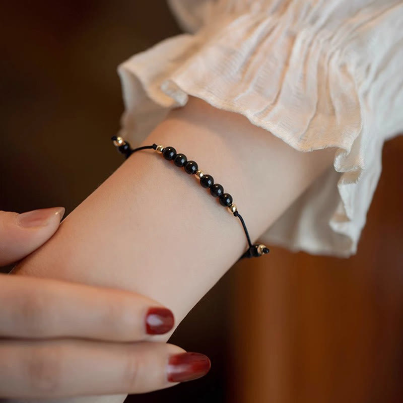 Pulsera de éxito con cuentas ultrafinas de obsidiana negra y cuarzo ahumado de Buddha Stones