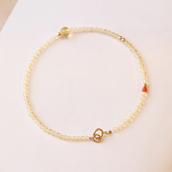 Pulsera protectora con cuentas de cobre bañadas en oro de 14 quilates y citrino ultrafinas de 2 mm de Buddha Stones