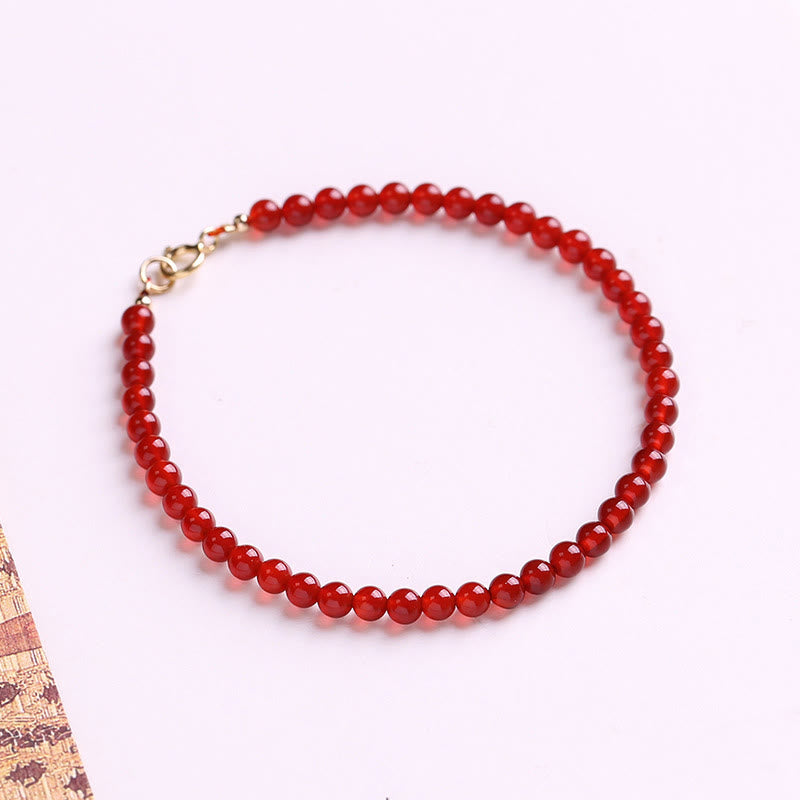 Pulsera de cuentas ultrafinas de ágata roja pequeña con Buddha Stones para calmar la mente