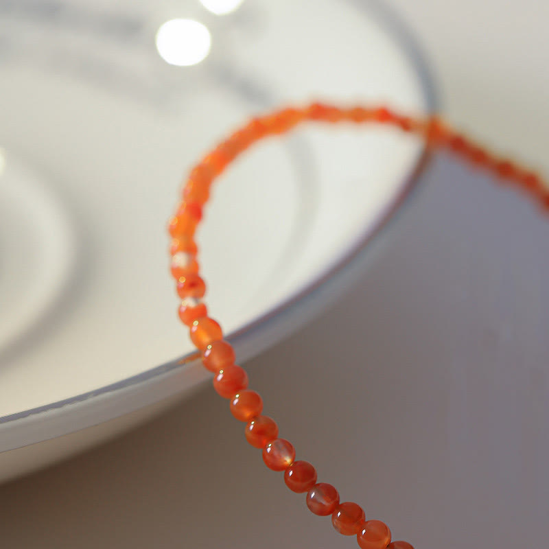 Pulsera de confianza con cuentas ultrafinas de ágata roja, cereza y caqui naturales de Buddha Stones