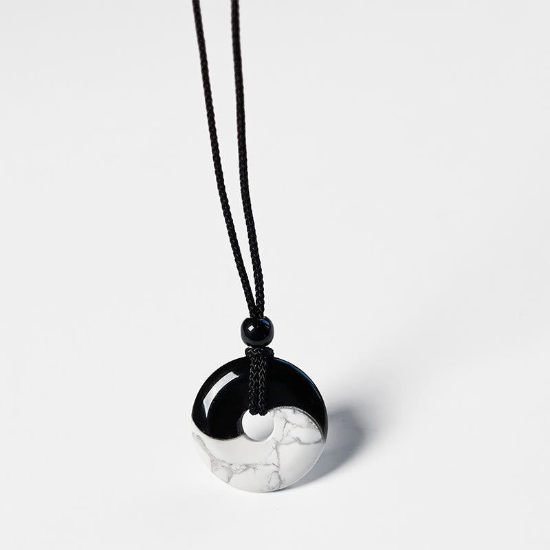 Collar con colgante de fuerza con cuerda trenzada y diseño de hebilla de paz Yin Yang con obsidiana negra natural y turquesa blanca y Buddha Stones