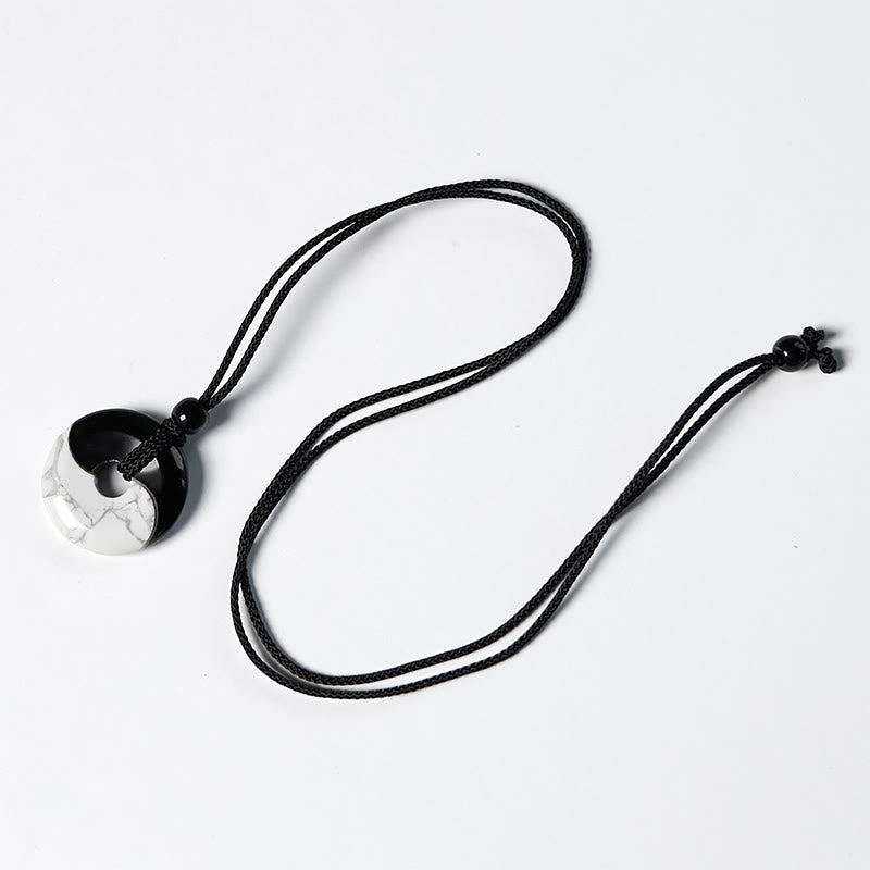 Collar con colgante de fuerza con cuerda trenzada y diseño de hebilla de paz Yin Yang con obsidiana negra natural y turquesa blanca y Buddha Stones