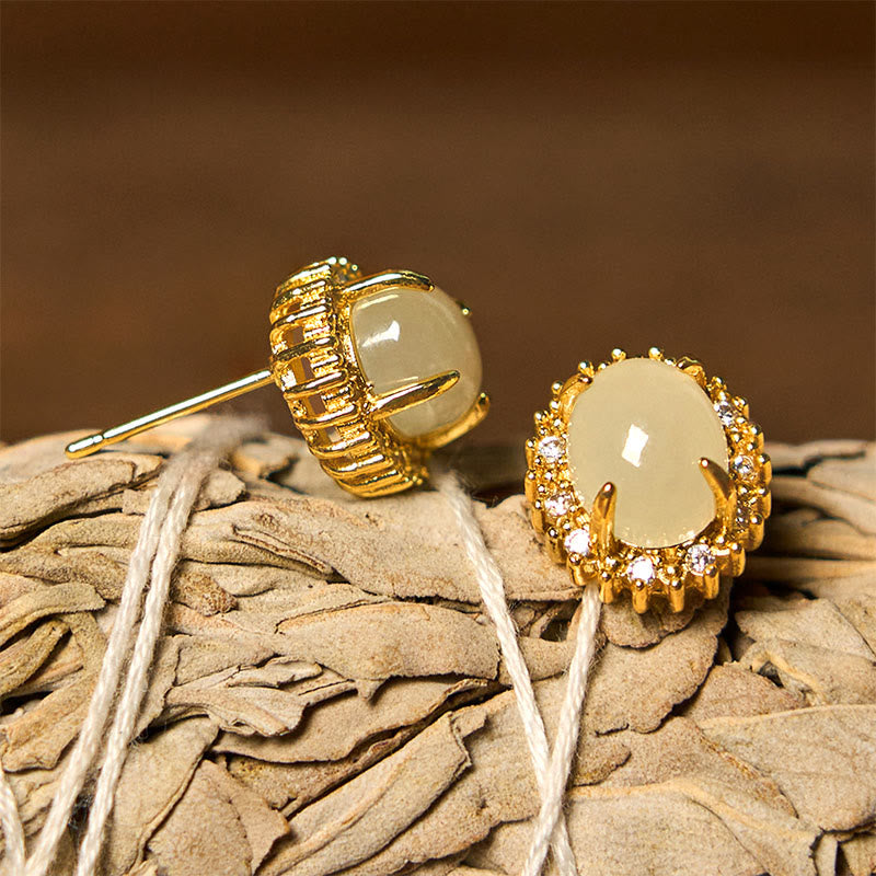 Pendientes de prosperidad de cobre con forma de huevo de jade hetiano natural y Buddha Stones