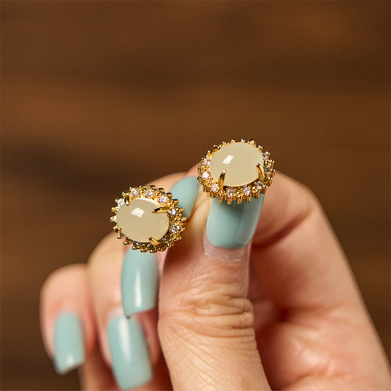 Pendientes de prosperidad de cobre con forma de huevo de jade hetiano natural y Buddha Stones