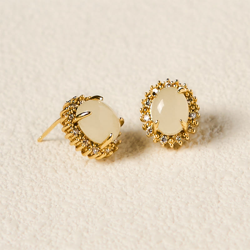 Pendientes de prosperidad de cobre con forma de huevo de jade hetiano natural y Buddha Stones