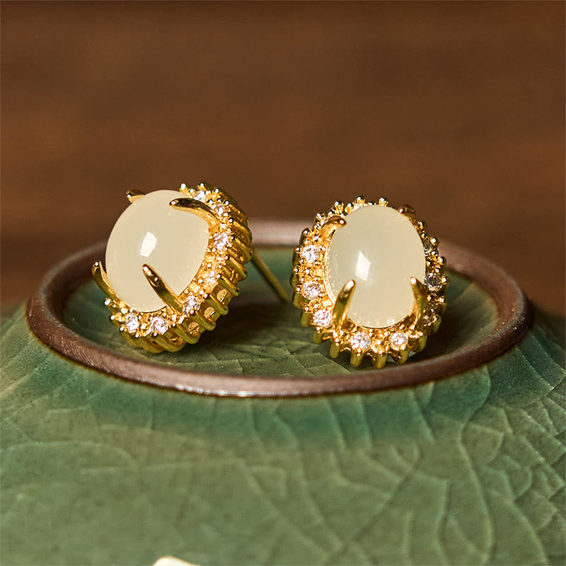 Pendientes de prosperidad de cobre con forma de huevo de jade hetiano natural y Buddha Stones