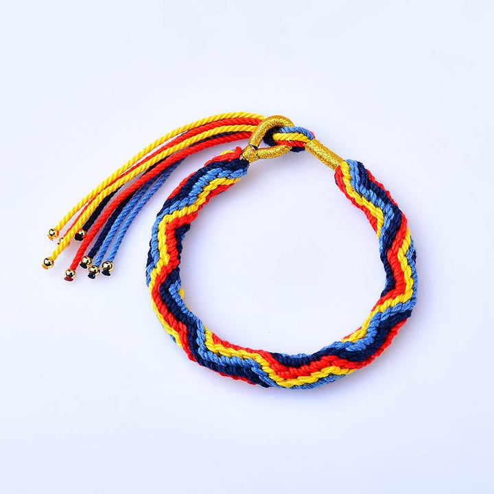 Pulsera de la suerte de cuerda de colores tejida a mano con Buddha Stones tibetanas