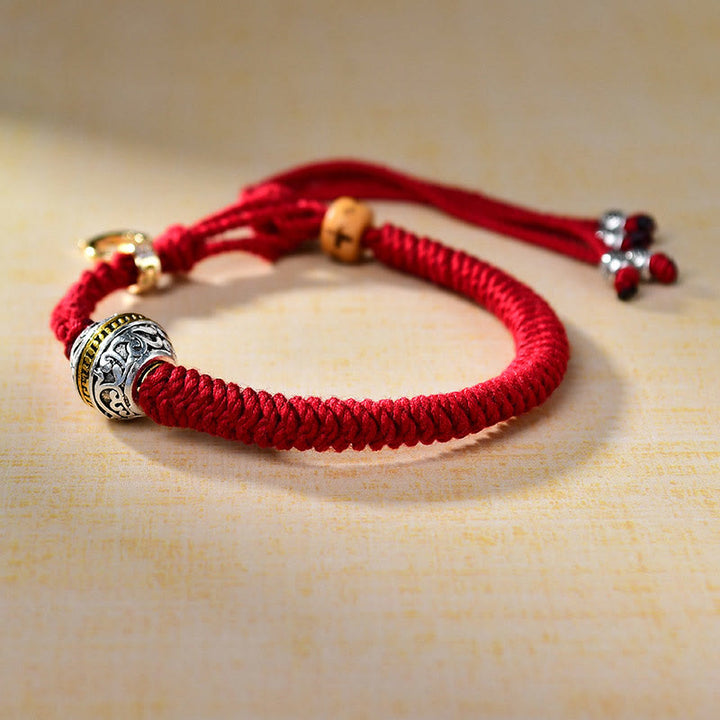 Pulsera trenzada tibetana con nudo de diamante y cuerda roja con Buddha Stones