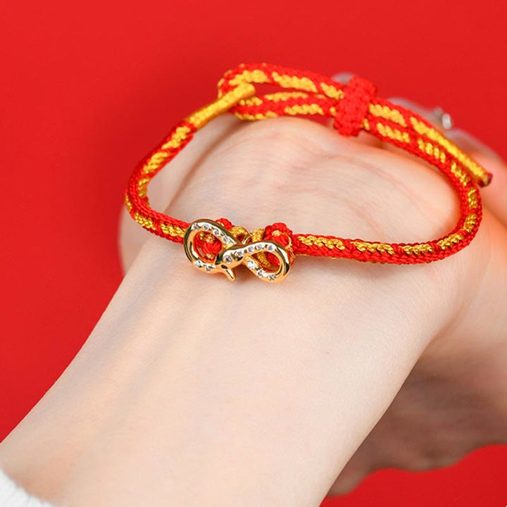 Pulsera trenzada con tira de Möbius y Buddha Stones con hilo rojo y el año de la serpiente