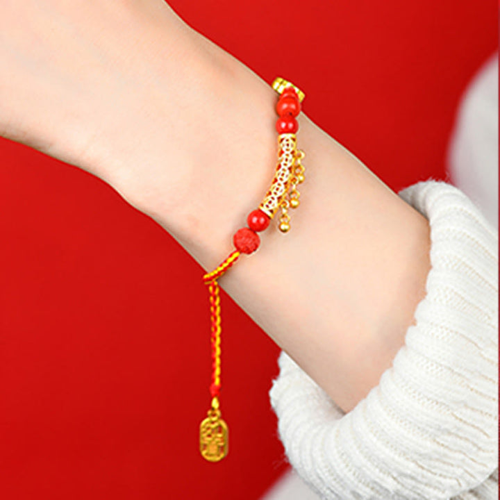 Pulsera de la calma de la marca Ruyi con campana de hilo rojo y cinabrio de Buddha Stones