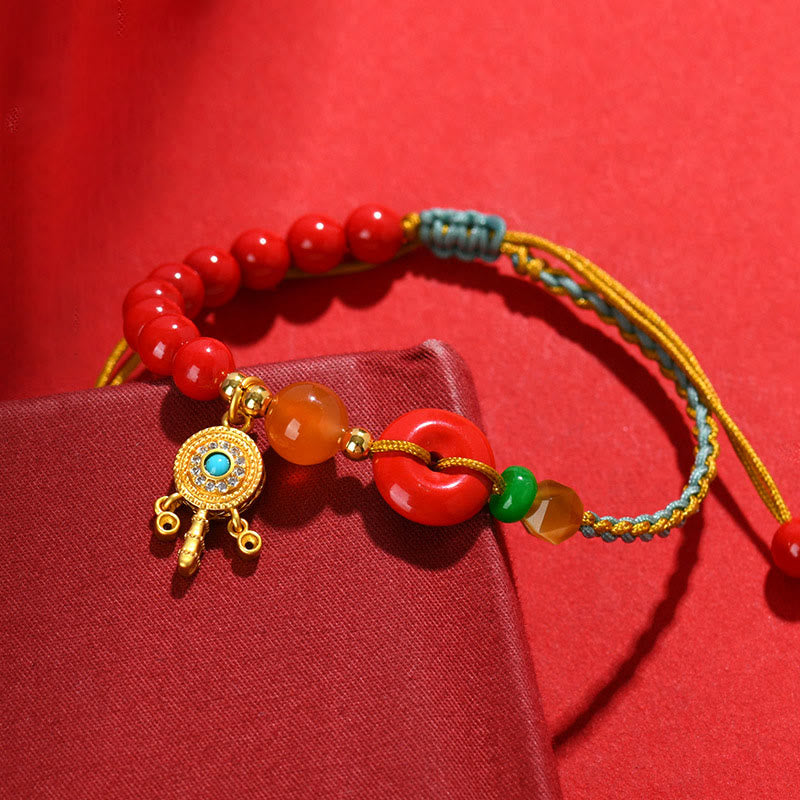 Pulsera con bendición de la paz con hilo de cinabrio y Buddha Stones