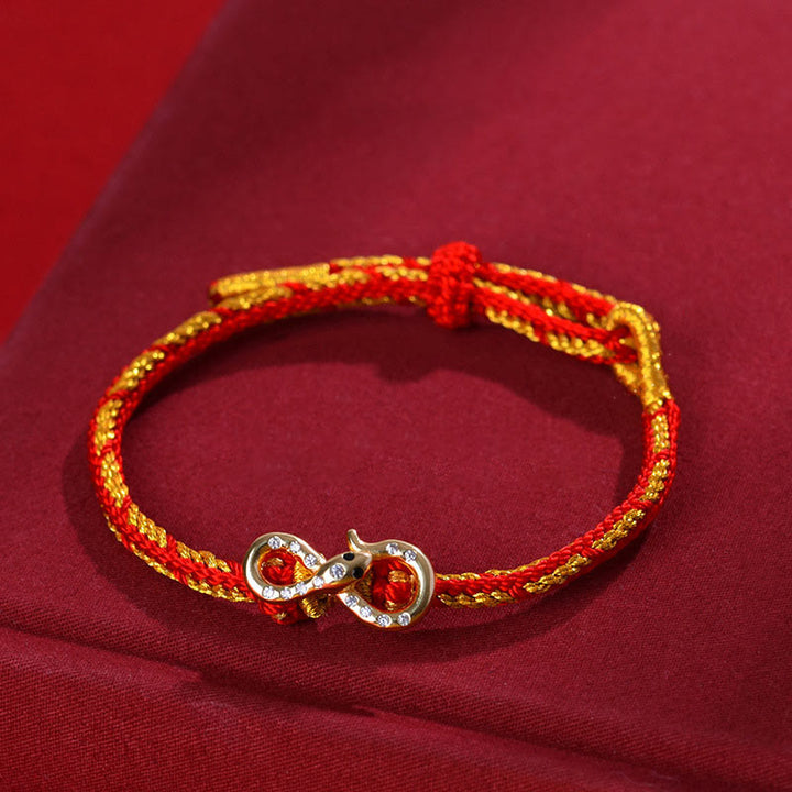 Pulsera trenzada con tira de Möbius y Buddha Stones con hilo rojo y el año de la serpiente
