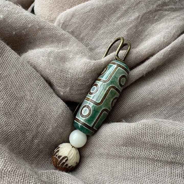 Broche protector de loto con semillas de Bodhi y cuentas Dzi de nueve Buddha Stones