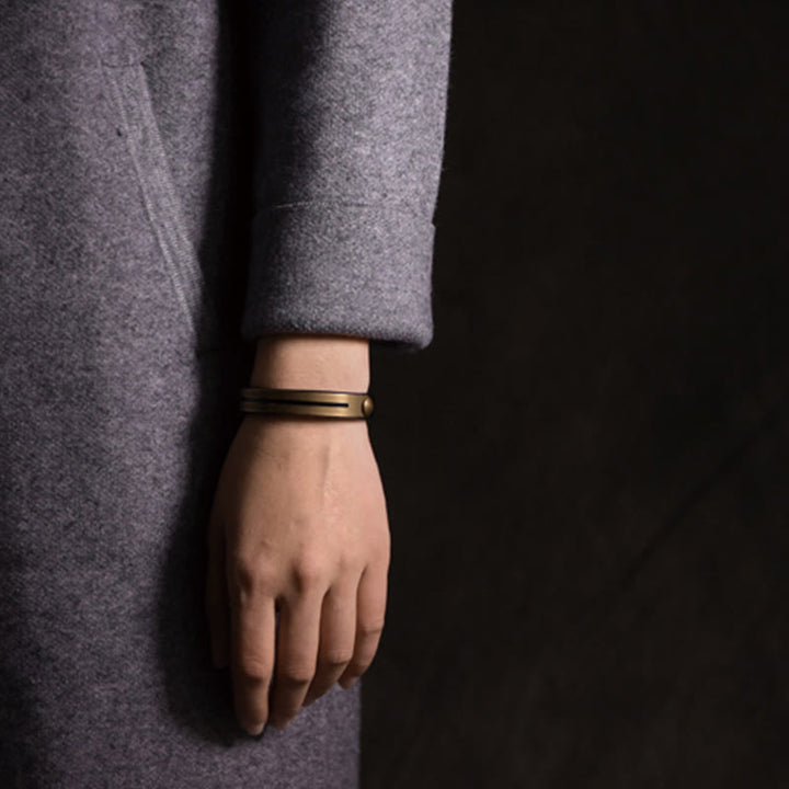 Pulsera de equilibrio de latón, cobre y cuero vintage con Buddha Stones