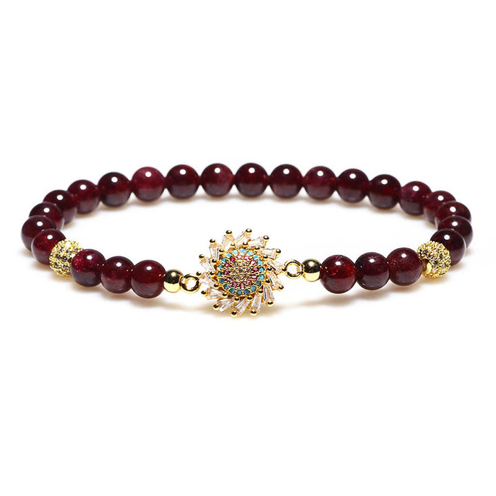 Pulsera protectora con cuentas de circonita y flor de granate natural de Buddha Stones