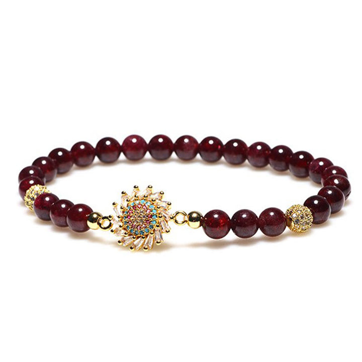 Pulsera protectora con cuentas de circonita y flor de granate natural de Buddha Stones