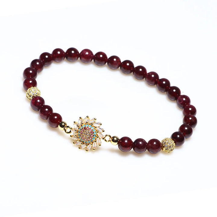 Pulsera protectora con cuentas de circonita y flor de granate natural de Buddha Stones
