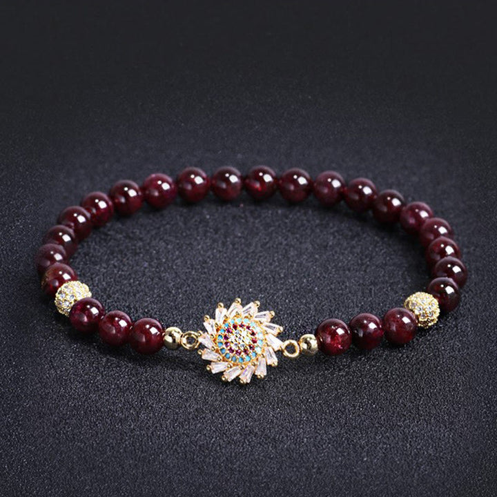 Pulsera protectora con cuentas de circonita y flor de granate natural de Buddha Stones
