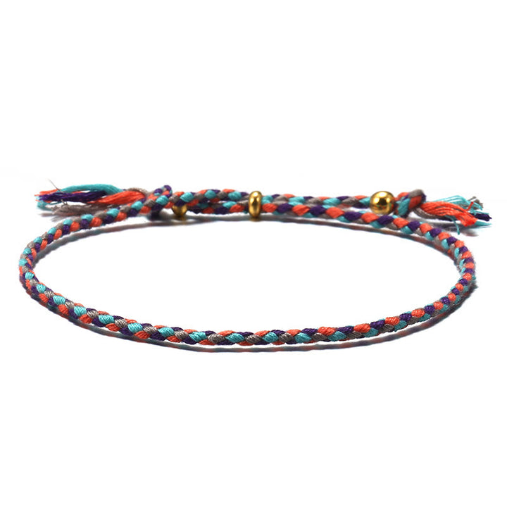 Pulsera de armonía ajustable con borlas trenzadas de cuerda de colores hecha a mano con Buddha Stones