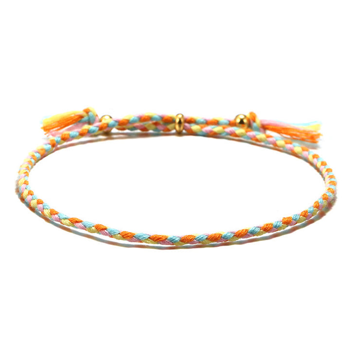 Pulsera de armonía ajustable con borlas trenzadas de cuerda de colores hecha a mano con Buddha Stones