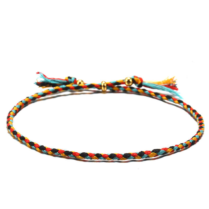 Pulsera de armonía ajustable con borlas trenzadas de cuerda de colores hecha a mano con Buddha Stones