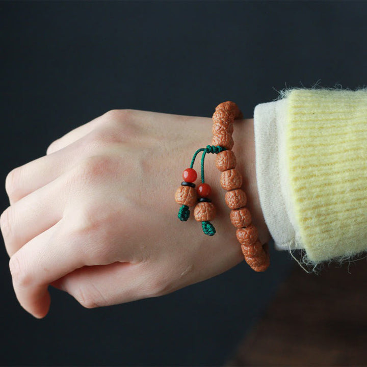 Pulsera de riqueza con semillas de ágata y rudraksha tibetano y Buddha Stones