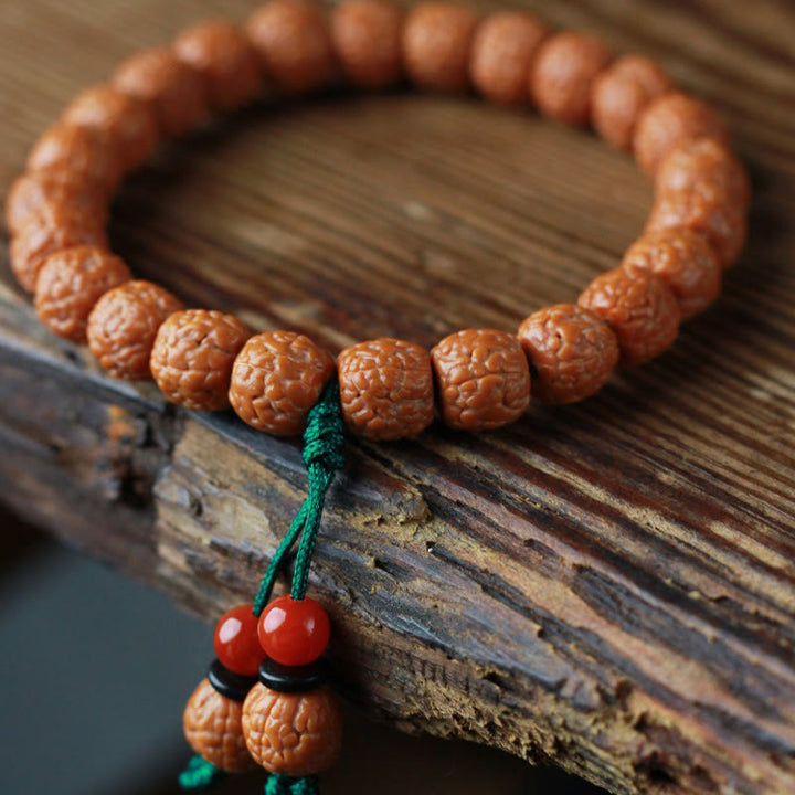 Pulsera de riqueza con semillas de ágata y rudraksha tibetano y Buddha Stones