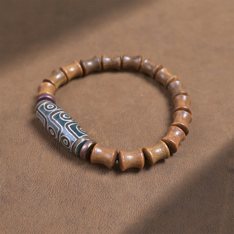 Pulsera de la paz de sándalo verde con cuentas Dzi tibetanas de nueve ojos y Buddha Stones