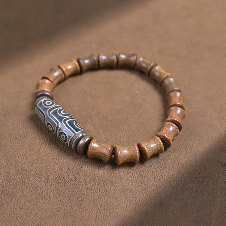 Pulsera de la paz de sándalo verde con cuentas Dzi tibetanas de nueve ojos y Buddha Stones