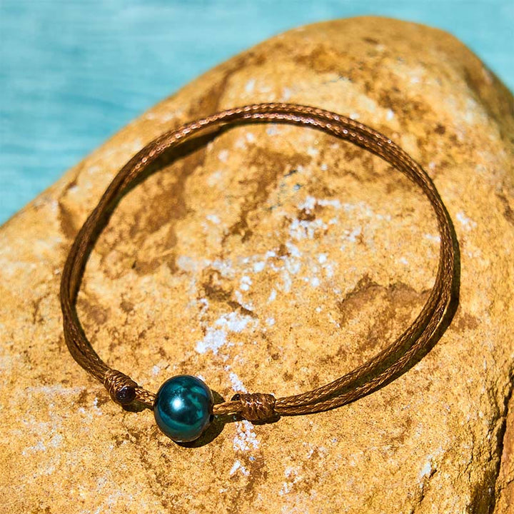Pulsera curativa con cuerda de cera y cuentas de perla negra de Tahití naturales y Buddha Stones